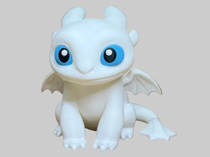 Light Fury Dragon – white 3D printed dragon figure with blue eyes, 12.5 cm tall