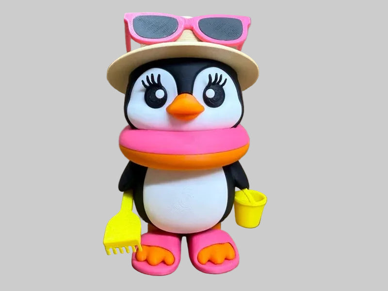 Mrs Penguin Beach – 12 cm 3D printed penguin with pink sunglasses, float, bucket and spade